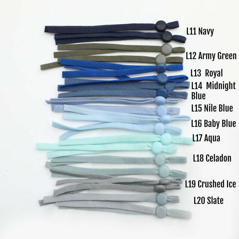 May include: A set of 10 different colored elastic straps with plastic stoppers. The colors are navy, army green, royal blue, midnight blue, Nile blue, baby blue, aqua, celadon, crushed ice, and slate.