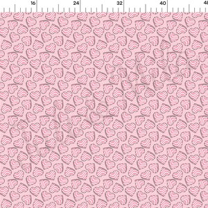 May include: Pink fabric with a repeating pattern of hearts. Each heart has a striped design in pink and white, outlined in gray. The background is a solid light pink color. The fabric is suitable for various craft projects.