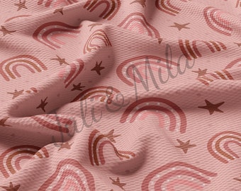May include: Pink fabric with a repeating pattern of brown and pink rainbows and brown stars.