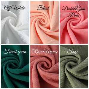 May include: Six fabric swatches in different colours: off-white, blush, bubblegum pink, forest green, rose mauve, and sage. The fabric has a textured waffle weave.