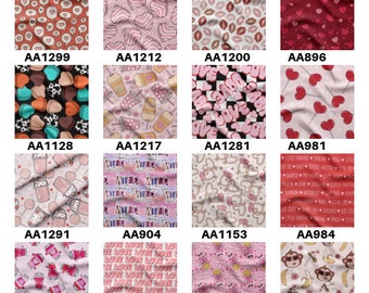 May include: A collection of 16 different fabric designs featuring various Valentine's Day themes. The designs include hearts, lips, candy, and other romantic symbols. The fabrics are in a variety of colors, including pink, red, and white.