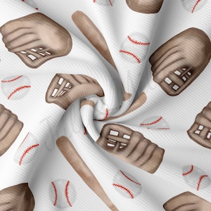 May include: White fabric with a repeating pattern of brown baseball mitts, wooden bats, and red baseball stitches.