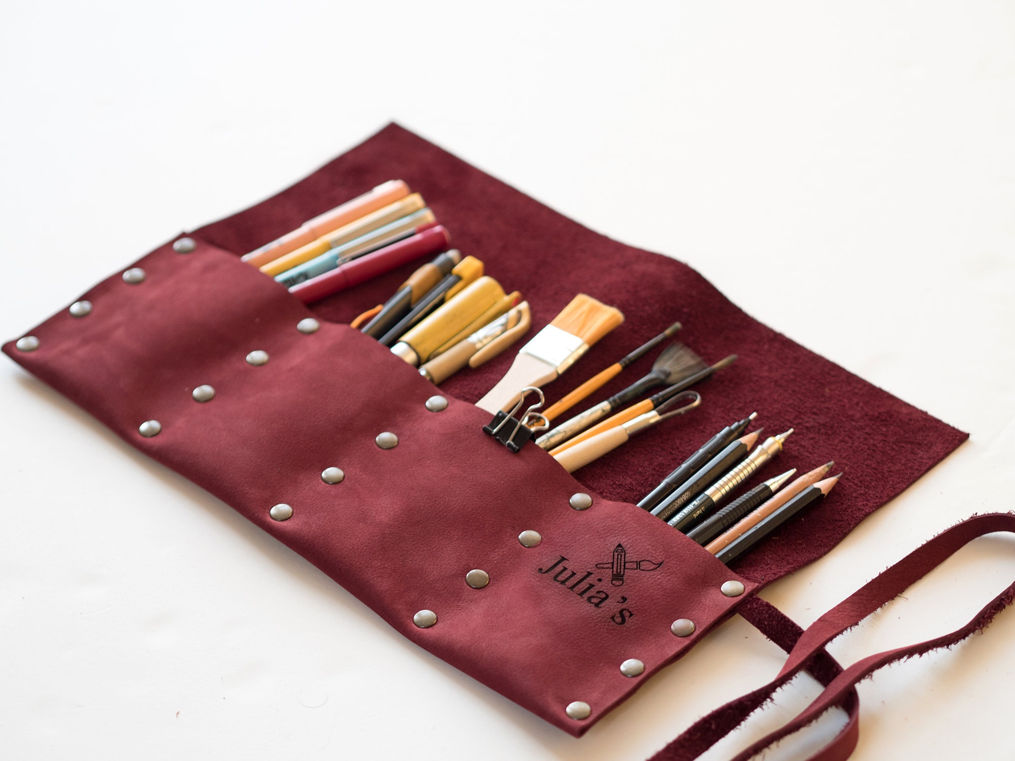 jaald Genuine Leather Pencil Roll brush Case Pen Holder Organizer Brushes  Ruler Stationary Pouch Gif…See more jaald Genuine Leather Pencil Roll brush