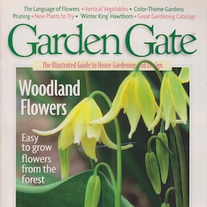 May include: The cover of "Garden Gate" magazine features a close-up of yellow woodland flowers with green stems and leaves. The magazine title is in large green letters, with the subtitle "The Illustrated Guide to Home Gardening and Design."