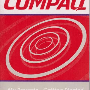 May include: A red and white Compaq Presario Getting Started guide. The cover features the Compaq logo in red, with a white and red spiral design on a red background. The text "My Presario - Getting Started" is at the bottom.