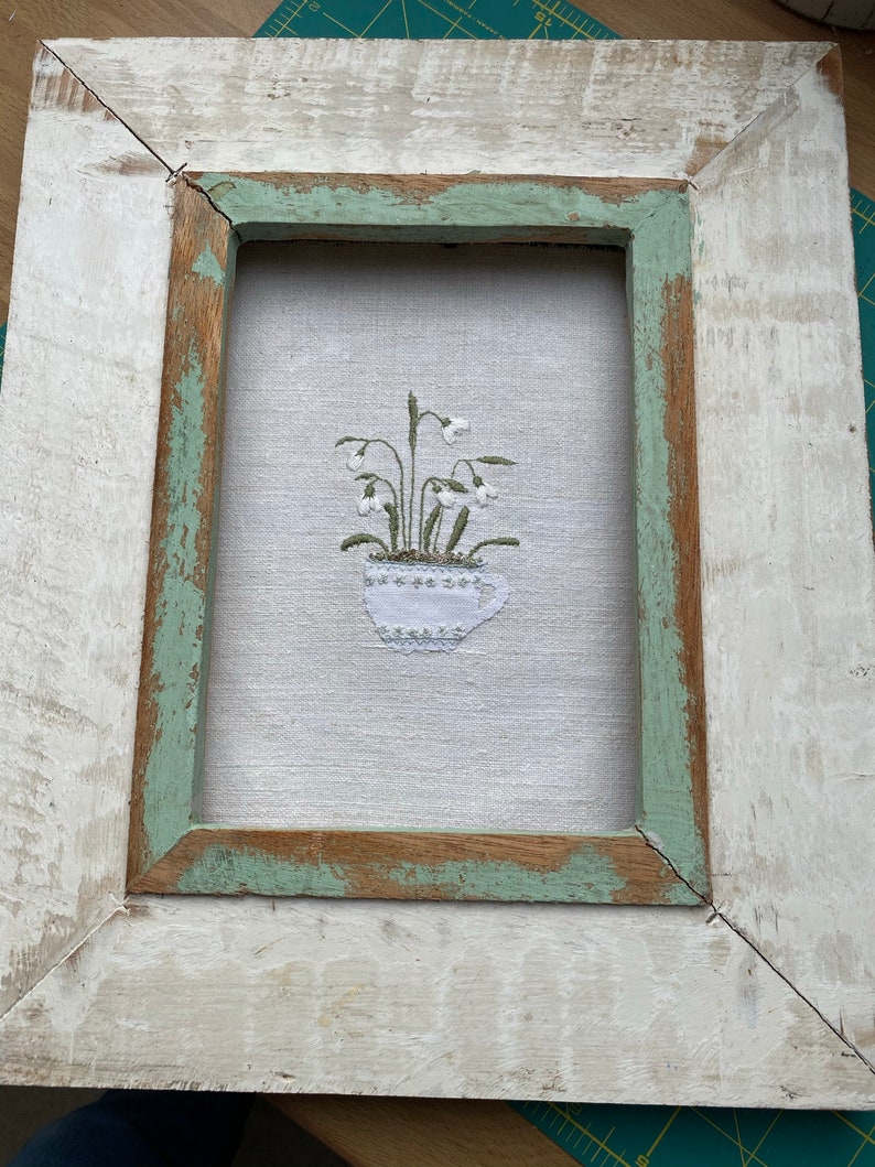 Snowdrops in a tea cup embroidery pattern