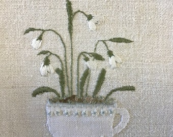 Snowdrops in a tea cup embroidery pattern