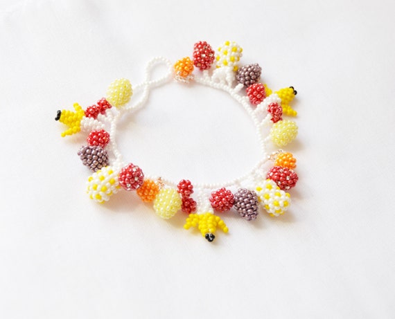 Beaded bracelets with charms sale
