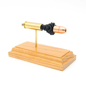 454 Casull with Hornady 300Gr XTP MAG hollow point bullet -- expanded ammunition ammo cartridge bullet model desk accessory anatomy of Pew