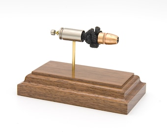 9mm Luger Federal 124Gr. HST JHP bullet ---  expanded police cartridge training model or desk accessory firearm safety personal defense
