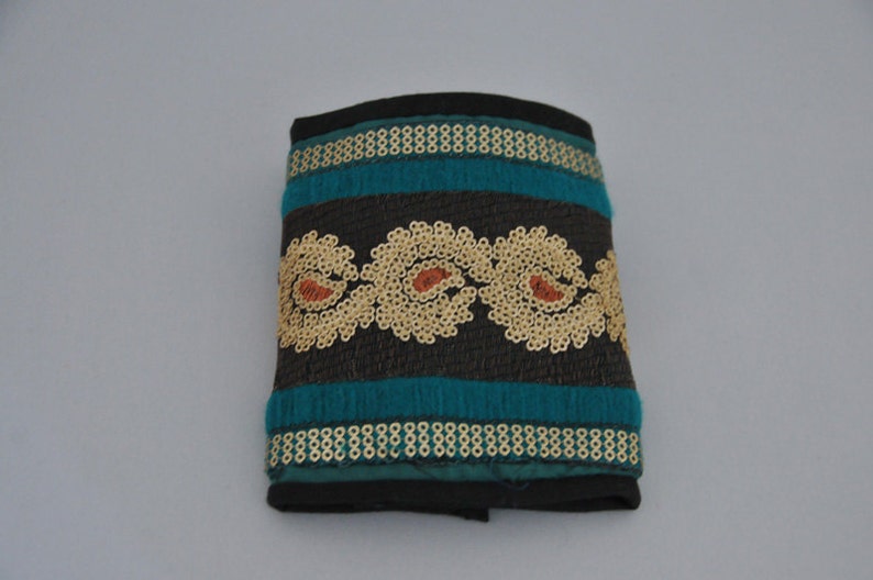 Embroidered and embellished hand stitched wallets