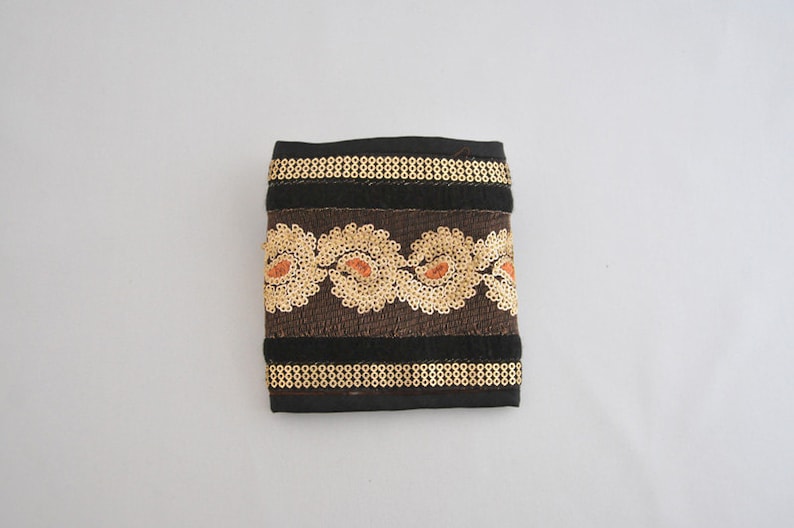 Embroidered and embellished hand stitched wallets