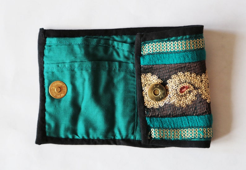 Embroidered and embellished hand stitched wallets