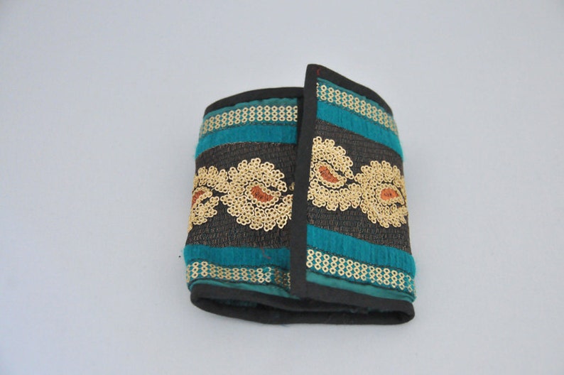 Embroidered and embellished hand stitched wallets