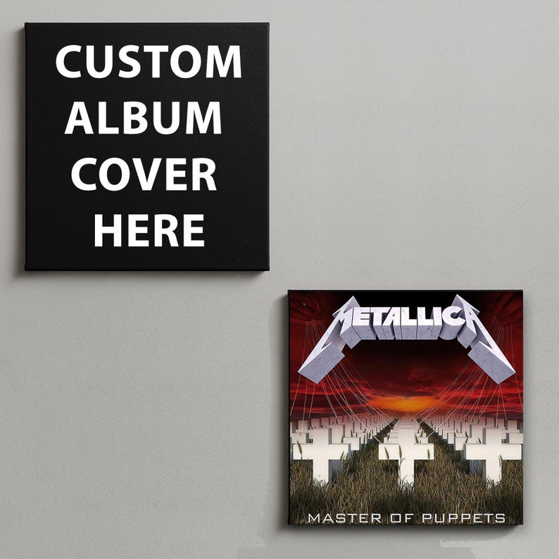 May include: Two square wall art canvases. The left canvas is black with the white text CUSTOM ALBUM COVER HERE. The right canvas features the Metallica Master of Puppets album cover art, showing white crosses in a field under a red sky.