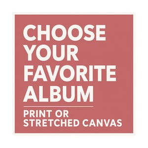 May include: A square graphic with a dusty rose background and white text that reads CHOOSE YOUR FAVORITE ALBUM followed by a horizontal line and the text PRINT OR STRETCHED CANVAS. The design is centered and uses a bold, sans-serif typeface.