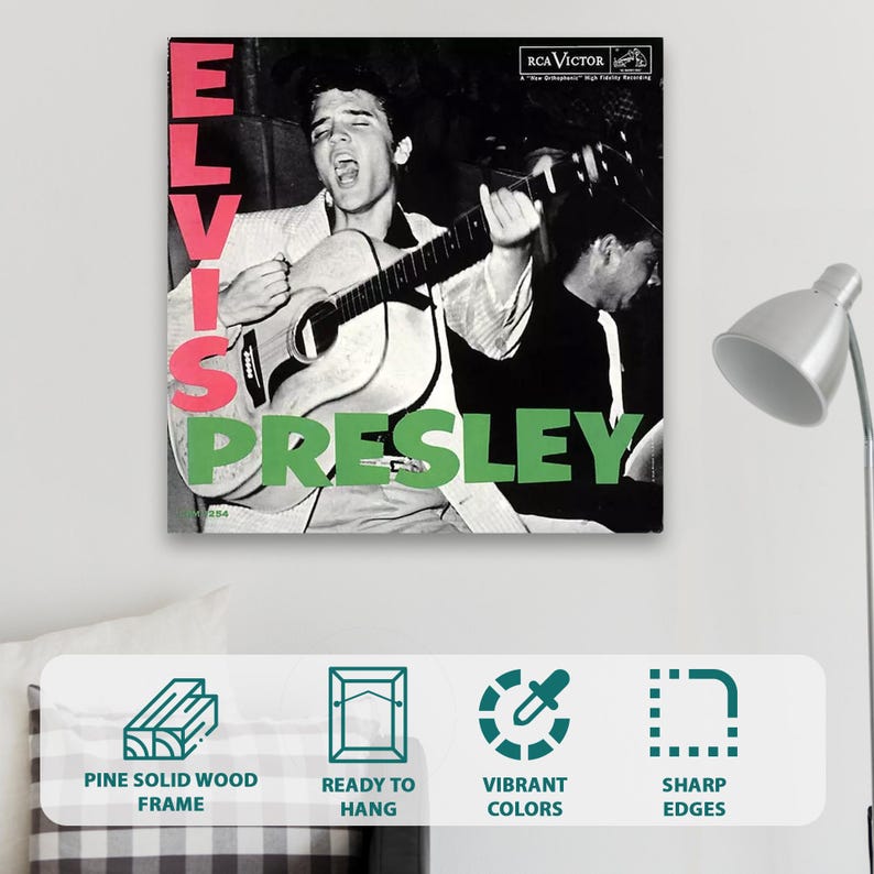 May include: A square wall art print featuring a black and white photograph of Elvis Presley playing an acoustic guitar. The name ELVIS is printed in large pink vertical letters on the left, and PRESLEY is in large green letters at the bottom.