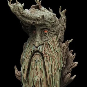 May include: A detailed sculpture of a tree-like figure with a long beard and leafy crown. The sculpture has a textured, bark-like appearance with red eyes and a green and brown color palette. The figure is set against a black background.