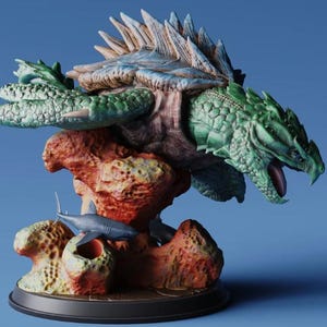 May include: A detailed resin figurine of a green, armored sea turtle creature with a spiked shell and open mouth, mounted on a textured orange coral base featuring a small grey shark, all set upon a circular black display stand.