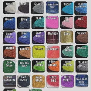 May include: A color chart titled ORNAMENT COLORS displaying thirty-seven square swatches of glitter and pigment in various shades including white, black, silver, blue, pink, red, purple, gold, green, orange, and halo finishes with text labels.