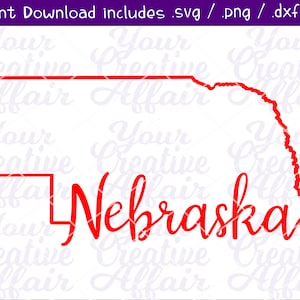 May include: Red outline of the state of Nebraska with the word "Nebraska" written in red cursive underneath.