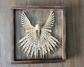 Clothespin Angel Wall Décor, Wall Hanging Art Wood Angel, Clothespin Winged Angel Framed Artistic Wood Wall Art with Cross Pendant.