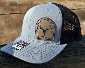 Show Me Your Antlers leather patch hat - funny and cool cap! Hats make a great gift! Comes with a FREE matching sticker! hunting deer