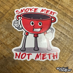 Smoke Meat Not Meth sticker with a little grill giving a thumbs up.