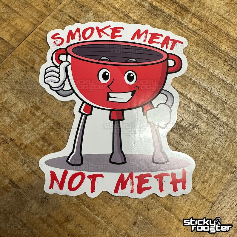 Smoke Meat Not Meth sticker with a little grill giving a thumbs up.