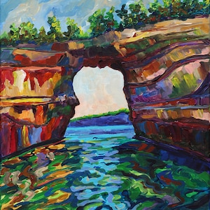 May include: A painting of a natural rock archway over a body of water. The archway is made of colorful, layered rock formations. The water is a vibrant blue and green, with reflections of the surrounding landscape. The sky is a light blue with white clouds.