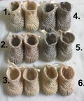 Chinese wave pattern baby booties product logo