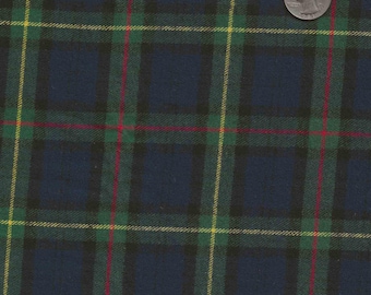 Flanelle écossaise bleue et verte avec de petites rayures jaunes et rouges.  Vendu par mètre.