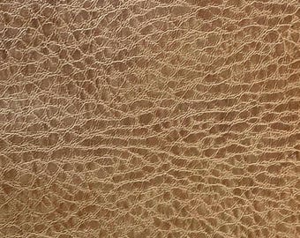 Vestige.  Similicuir texturé beige
