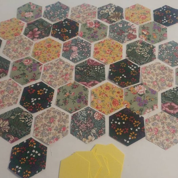 Pre Cut, Hexagon,Hexie, 1" finished size. EPP. Card Templates included. 42 pieces 7 each of 6 patterns. Yellow & Green Quilting Cotton.