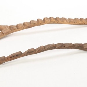 Pair of miniature Dogon grain ladders, symbolic sculptural forms in wood, West Africa (Mali)