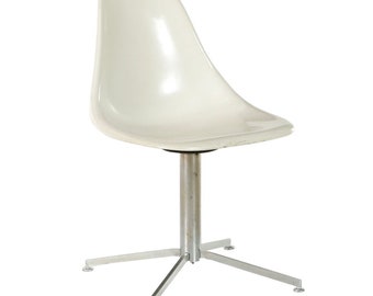 Vintage Molded Fiberglass Swivel Shell Chair, with chrome base.  Eames inspired