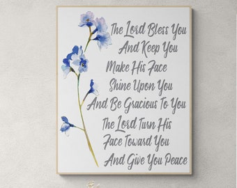 Puede incluir: Una impresión enmarcada en blanco con un diseño floral de acuarela y el texto "The Lord Bless You And Keep You Make His Face Shine Upon You And Be Gracious To You The Lord Turn His Face Toward You And Give You Peace".