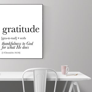May include: A black and white printable wall art print with the word "gratitude" defined as "thankfulness to God for what He does" and a reference to 1 Chronicles 16:34.