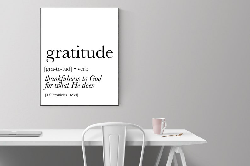 May include: A black and white printable wall art print with the word "gratitude" defined as "thankfulness to God for what He does" and a reference to 1 Chronicles 16:34.