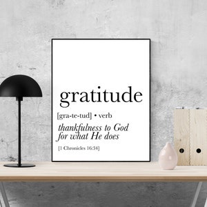 May include: Black and white printable wall art with the word "gratitude" defined as "thankfulness to God for what He does" with a scripture reference from 1 Chronicles 16:34.