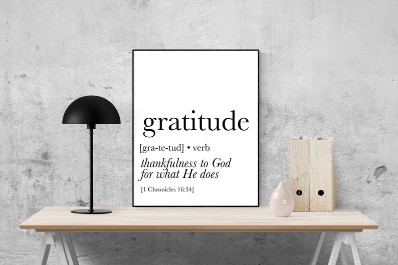 May include: Black and white printable wall art with the word "gratitude" defined as "thankfulness to God for what He does" with a scripture reference from 1 Chronicles 16:34.