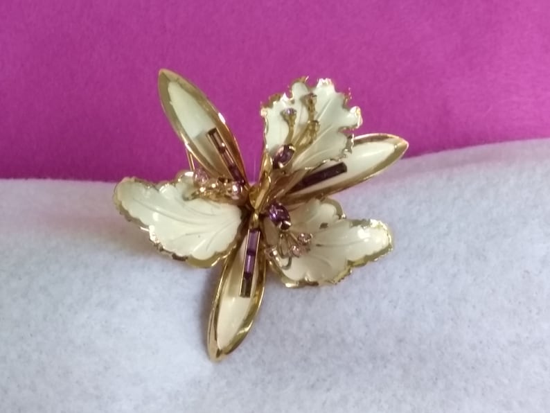 Flower Pin Free US Shipping Vintage Large White and Gold Tone Enameled Orchid Brooch with Lavender Rhinestone Accents Tiny Stone Missing