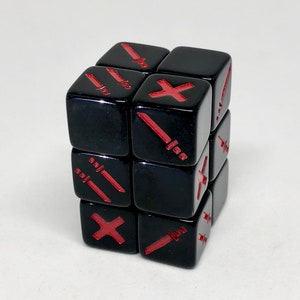 May include: A black cube puzzle with red sword and X symbols on each face. The cube is glossy and appears to be made of a hard plastic material. The symbols are evenly spaced and clearly visible.