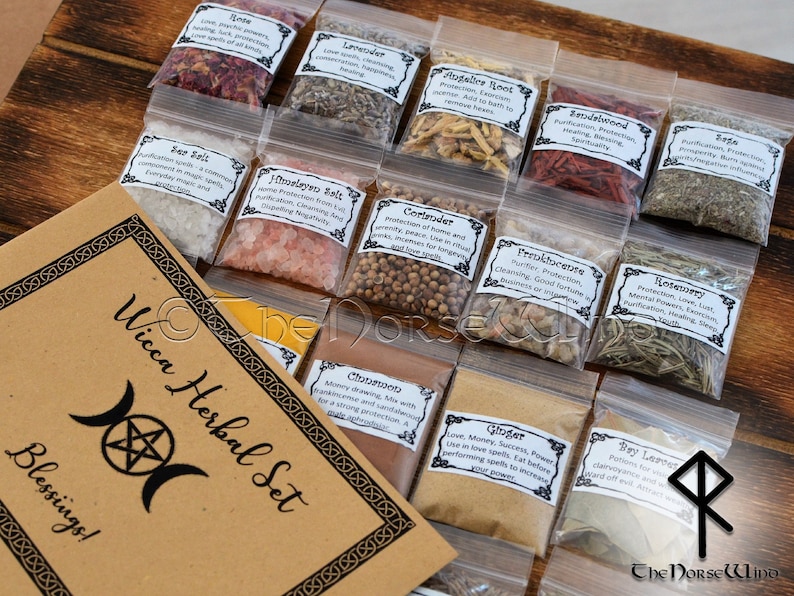 May include: A set of 16 small clear plastic bags filled with various dried herbs and spices. Each bag has a white label with the name of the herb or spice and its uses in Wiccan practices. The bags are arranged in a grid pattern on a wooden surface. The text on the label reads "Wicca Herbal Set" and "Blessings!"