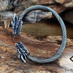  Pulsera de cabeza de dragón vikingo nórdico de metal, anillo de  brazo vikingo, brazaletes para hombres, plateado : Ropa, Zapatos y Joyería