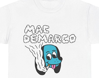 May include: White t-shirt with a blue cartoon dog smoking a cigarette and the text "MAC DEMARCO" above the dog.