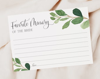 May include: White card with black text that reads "Favorite Memory of the Bride". The card has a green watercolor floral design at the top and bottom.