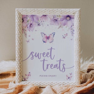 May include: A white frame with a purple butterfly and floral design. The text "sweet treats" is written in purple script with the words "Please Enjoy!" below.
