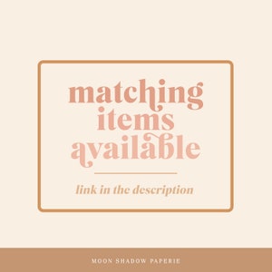 May include: A brown rectangle with rounded corners and a white background. The text "matching items available" is written in a pink font with a decorative swirl on the "s" in "items". Below the text is a thin line and the text "link in the description" in a smaller font. The rectangle is outlined in a brown border. The text "MOON SHADOW PAPERIE" is written in a brown font at the bottom of the image.