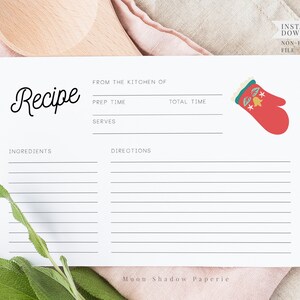 Puede incluir: Tarjeta de receta imprimible con una ilustración de guante de horno rojo y el texto "Receta" en una fuente decorativa. La tarjeta tiene espacios para ingredientes, instrucciones, tiempo de preparación, tiempo total y porciones.